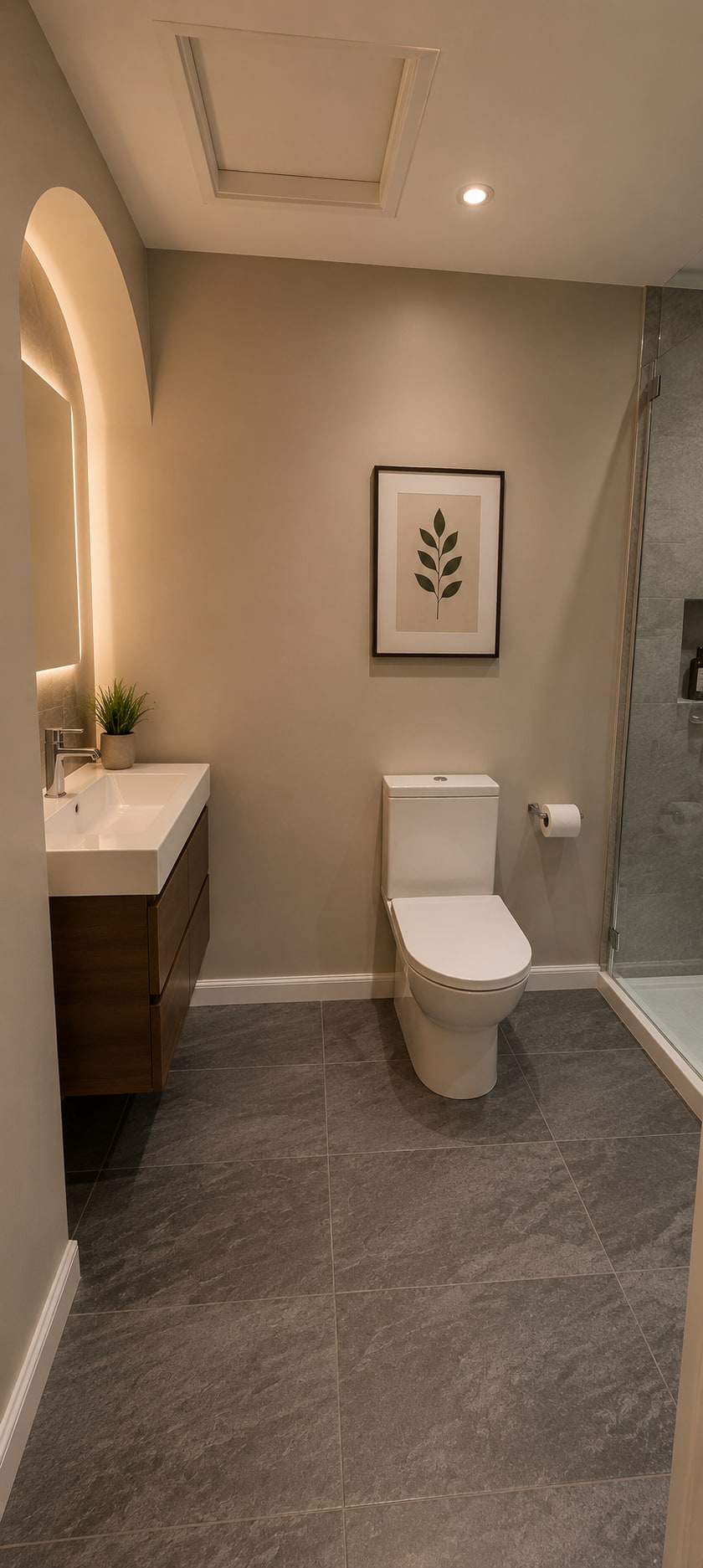 A Calm Greige Bathroom with Arched Vanity After