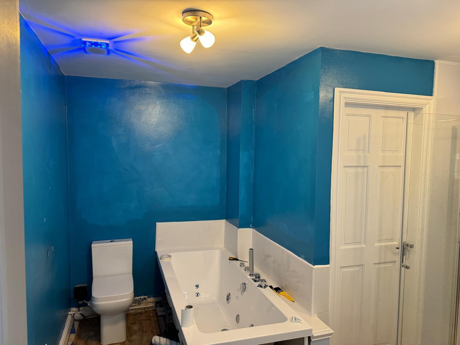 A Soft Greige Family Bathroom Before