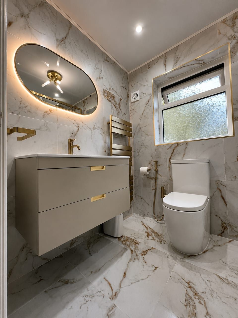 Calacatta Marble & Gold Shower Room — Calacatta marble-effect & brushed gold shower room by Bright Bathrooms, Greater Manchester