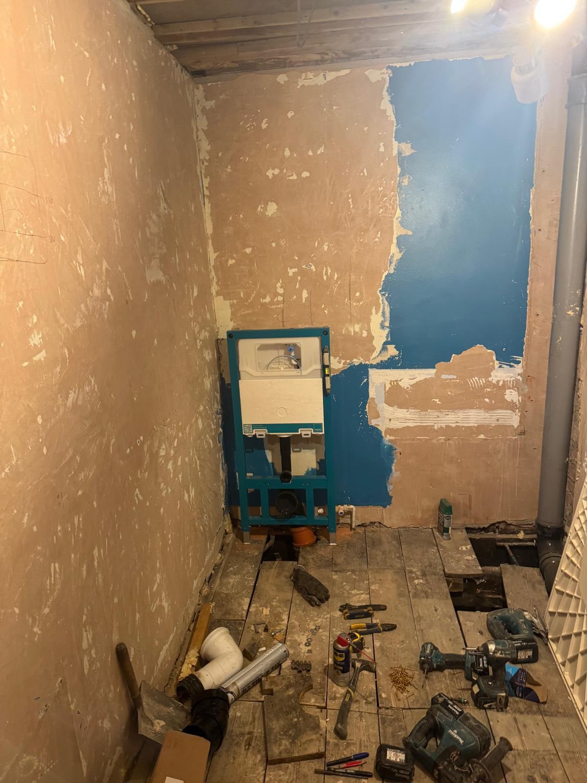 A Soft Greige Family Bathroom Before