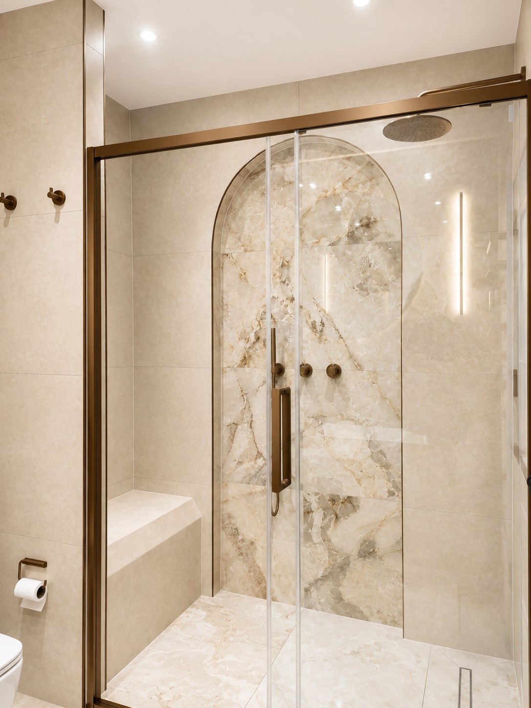 A Period Bathroom Reborn in Stone & Bronze After