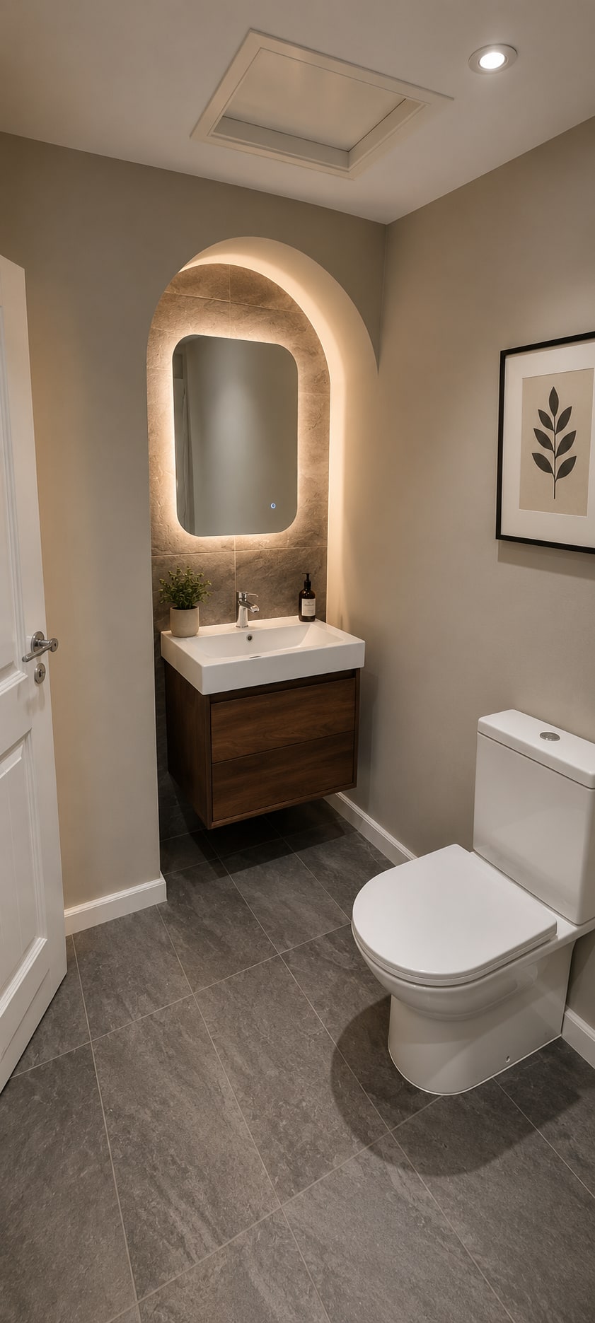 A Calm Greige Bathroom with Arched Vanity After
