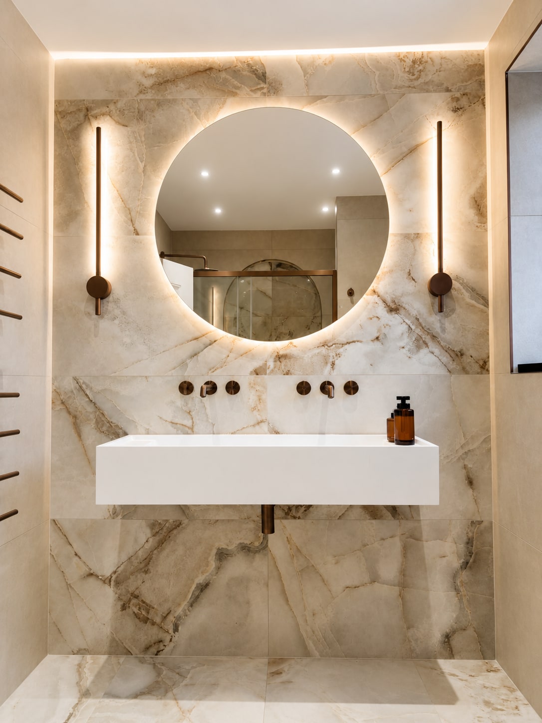 A Period Bathroom Reborn in Stone & Bronze After