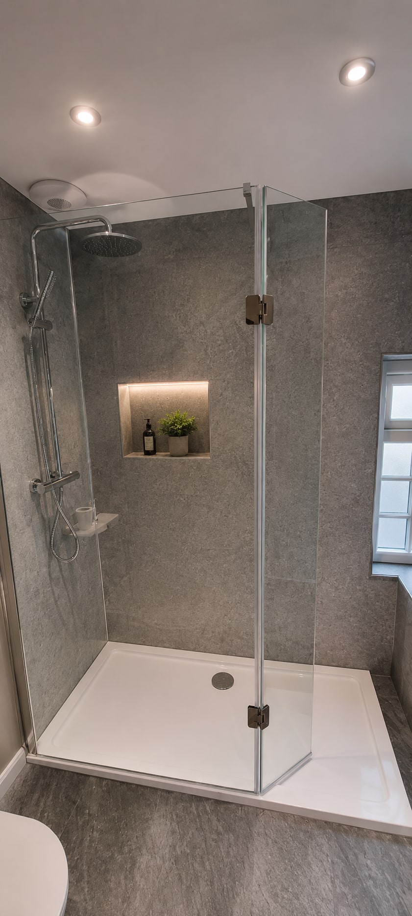 A Calm Greige Bathroom with Arched Vanity After