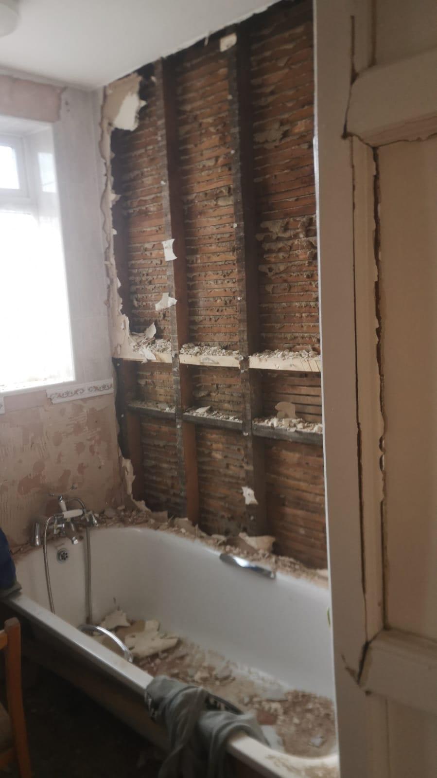 A Period Bathroom Reborn in Stone & Bronze Before